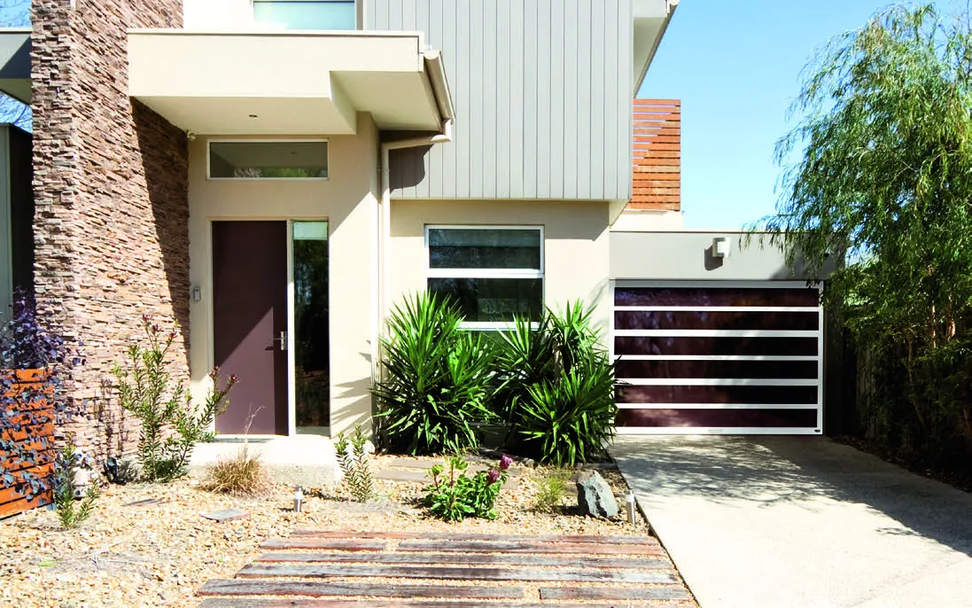 Amarr Horizon aluminum garage door in white finish with bronze tint glass