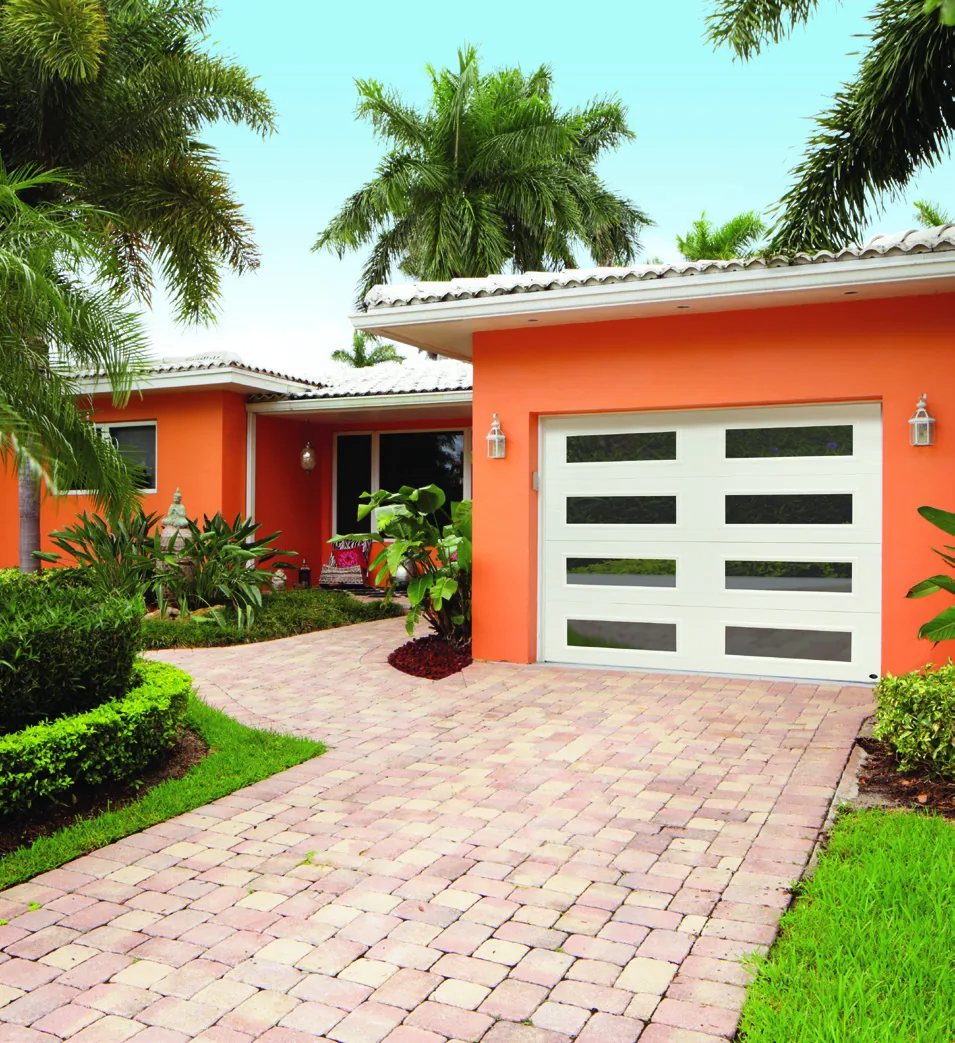 Amarr Heritage ribbed garage door in true white showing vertical window pattern detail