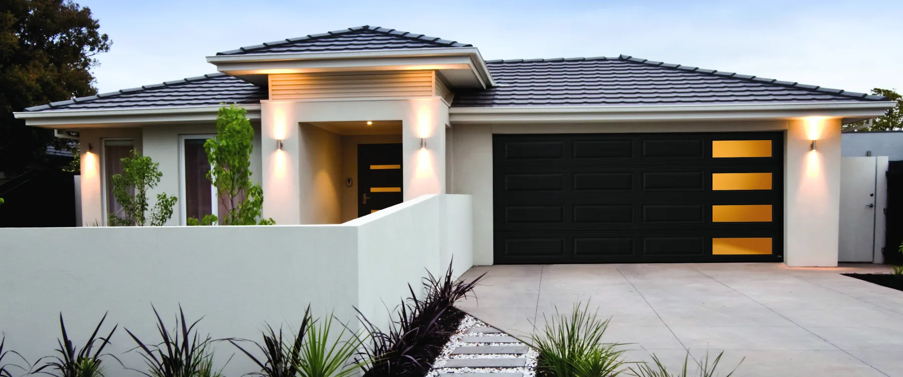 Amarr Olympus garage door in black with long panel window inserts across top section