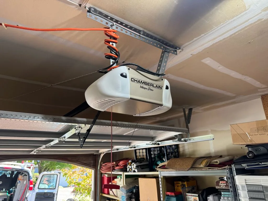 Old Chamberlain garage door opener mounted to the garage ceiling